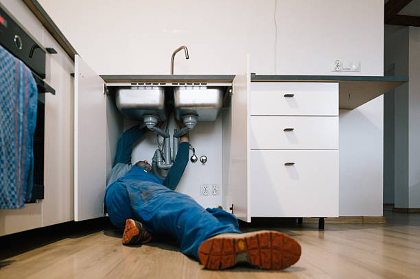Professional Emergency Plumber technician working in Covington, OH